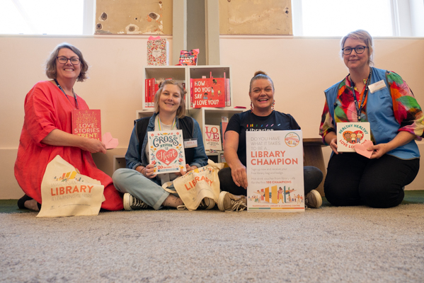 Library staff promoting the Library Champions program