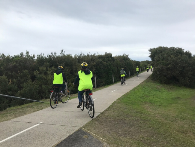 The group cycling to their next destination during one of the intensive workshops. 
