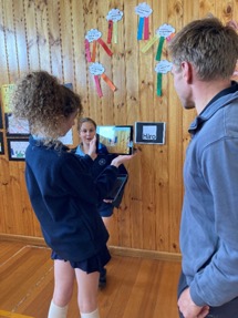 Students from Warrnambool East Primary School trailing the augmented reality animations.