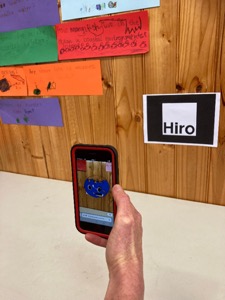 An example of one of the augmented reality animations- a world globe saying ‘Hi’ in different languages.