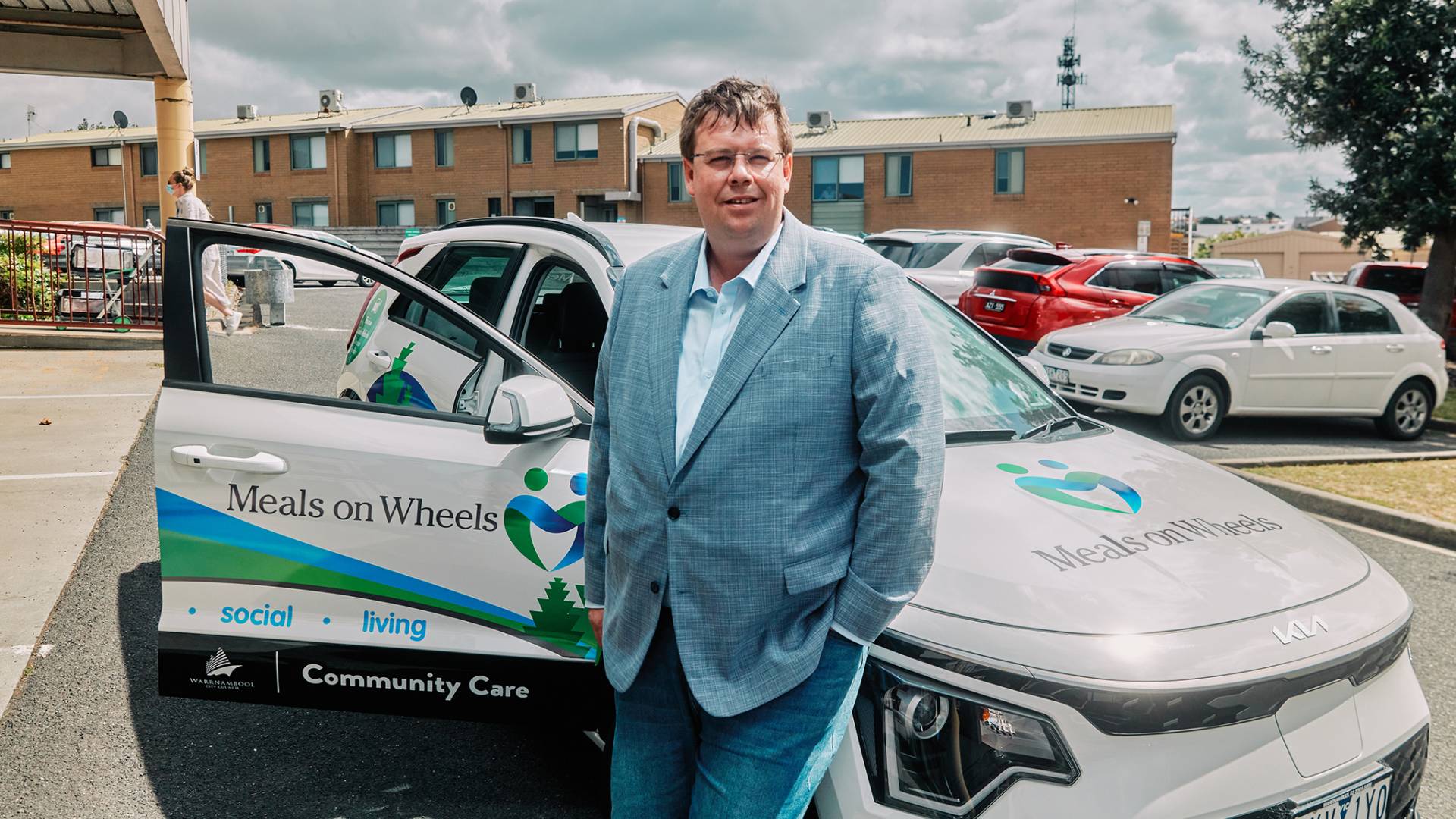 Mayor Ben Blain with the Meals on Wheels electric vehicle