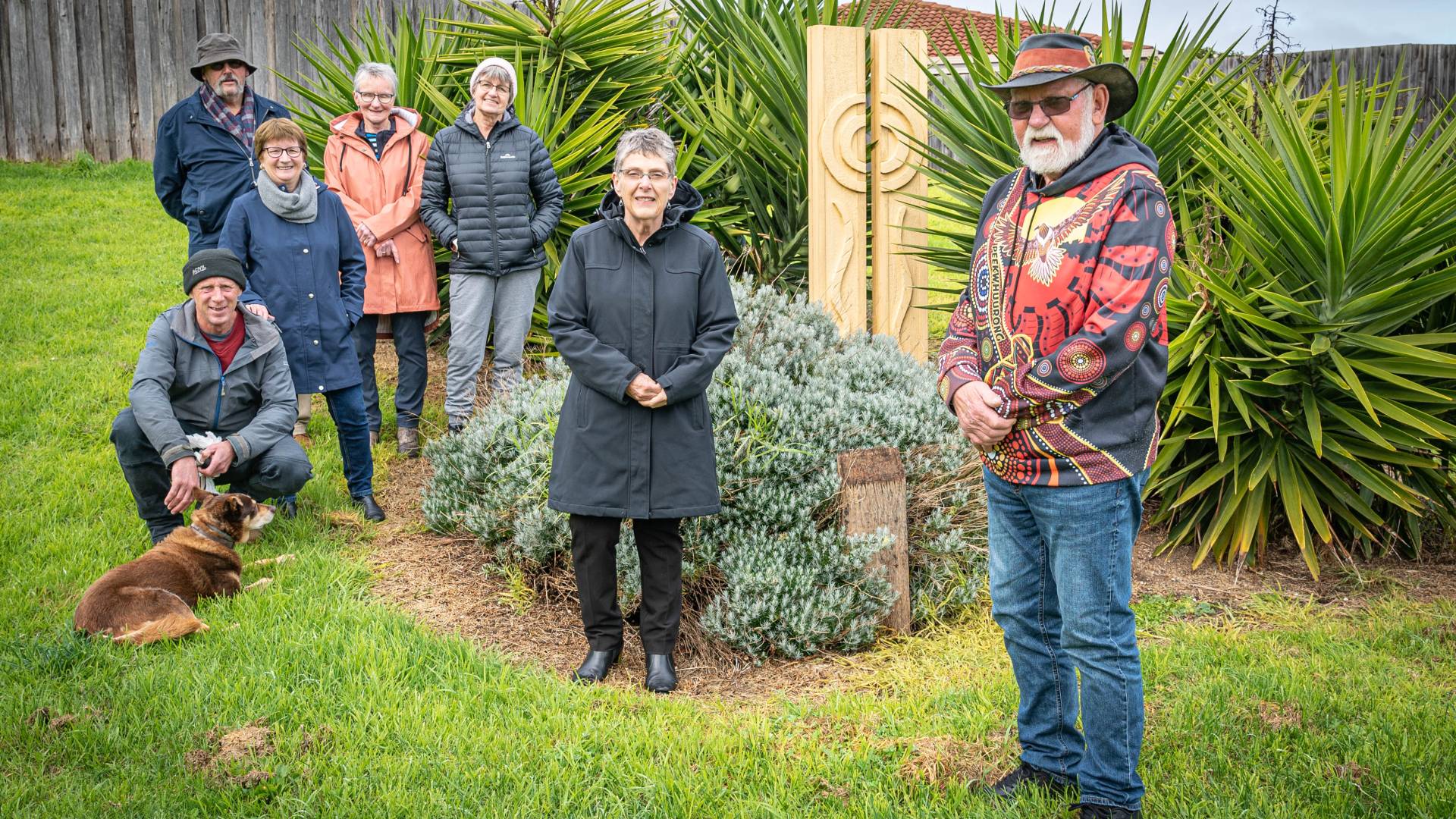 Uncle Robert Lowe (right), Mayor Vicki Jellie and members of the Merrivale community in Marrang Park