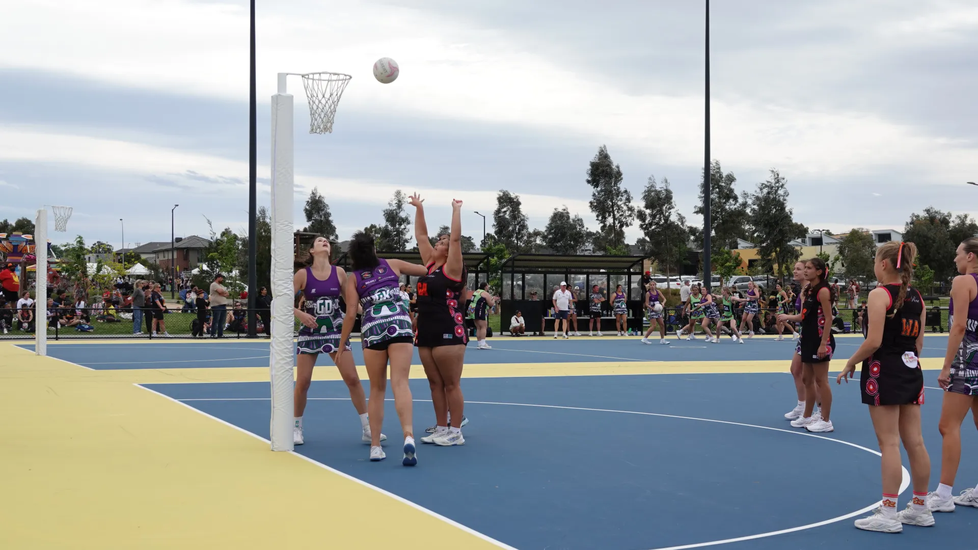 Netball action from the 2025 Statewide Carnival