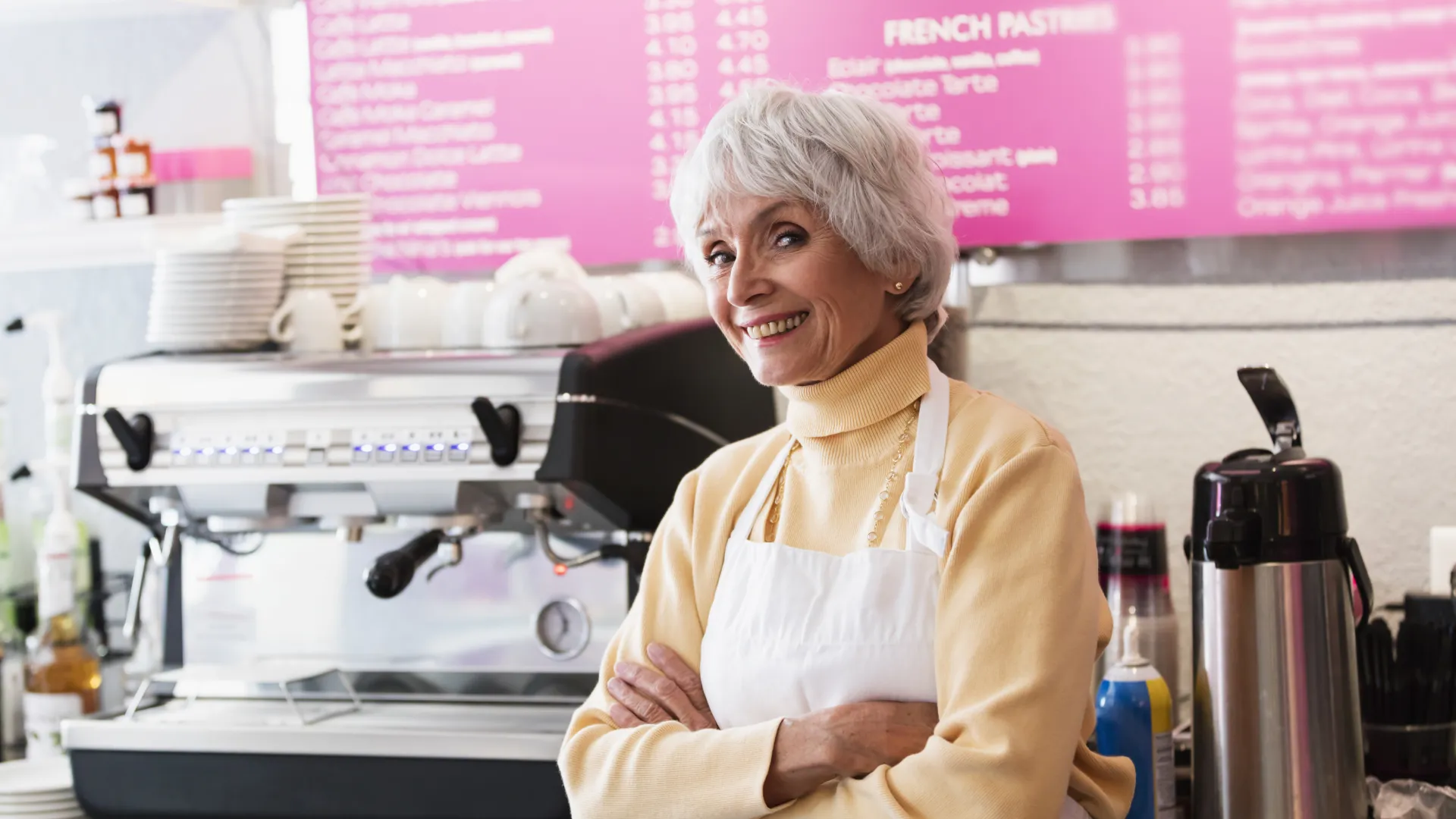 Older worker in cafe