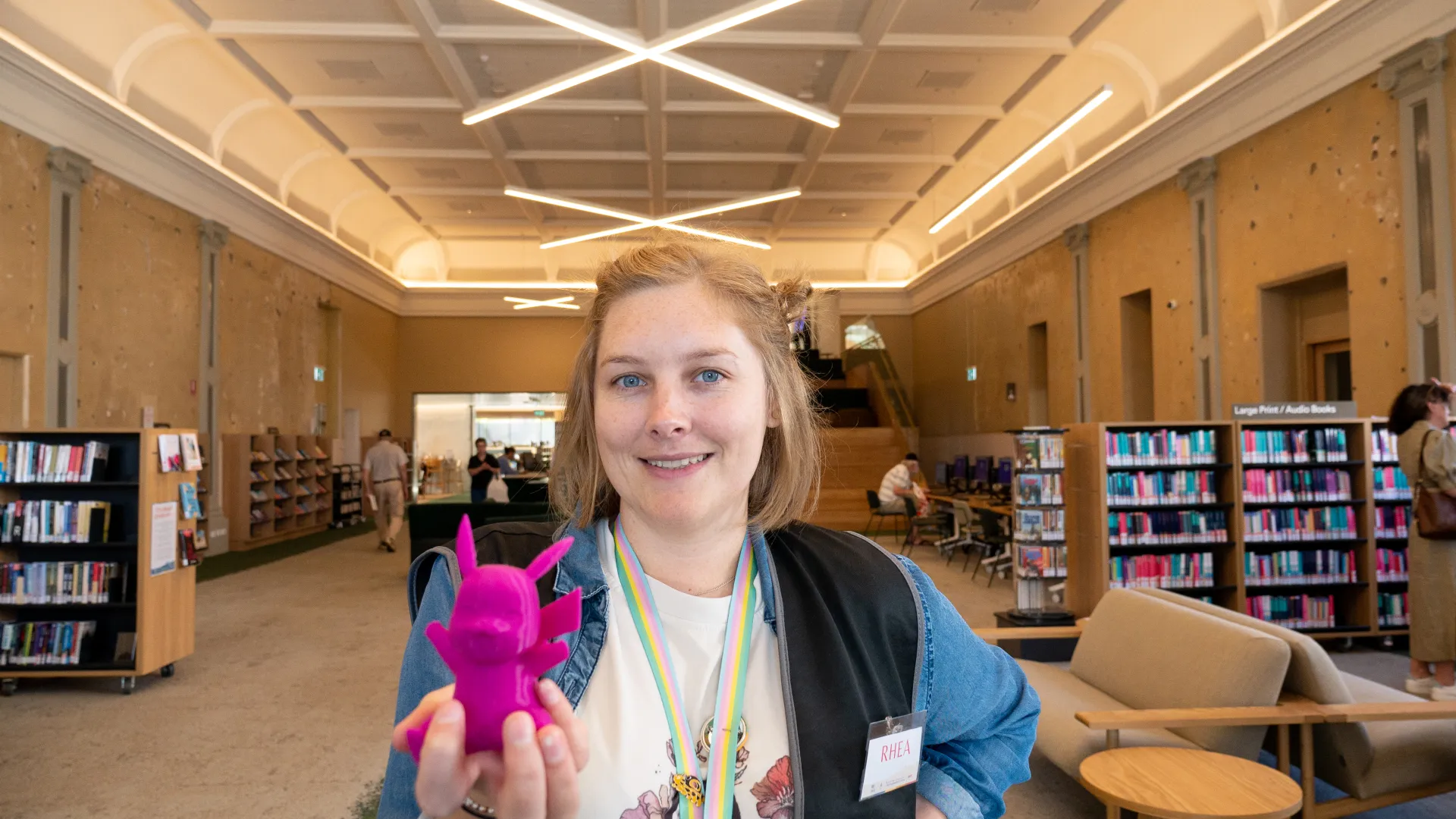 Digital Tech Programs Library Officer Rhea Kirkwood with a 3D-printed Pikachu.