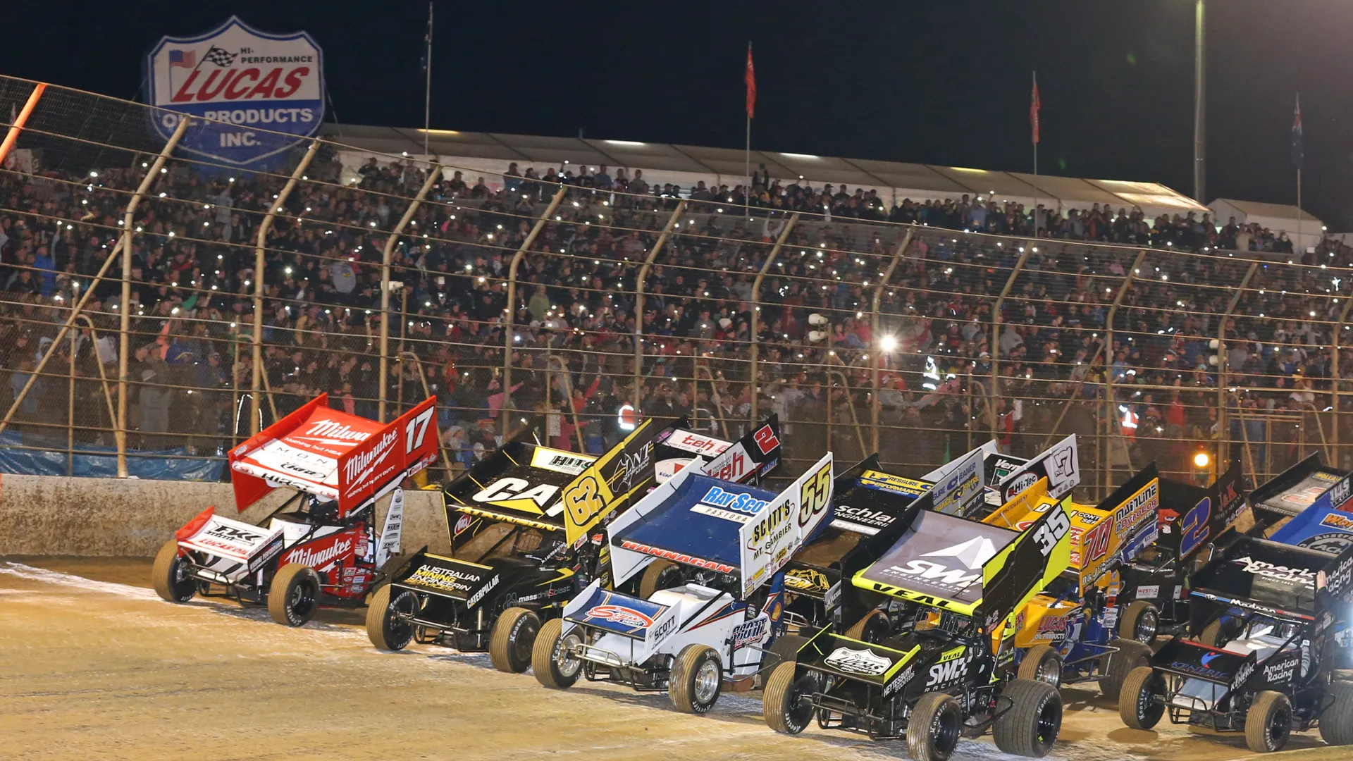 Speedway cars ready to race.