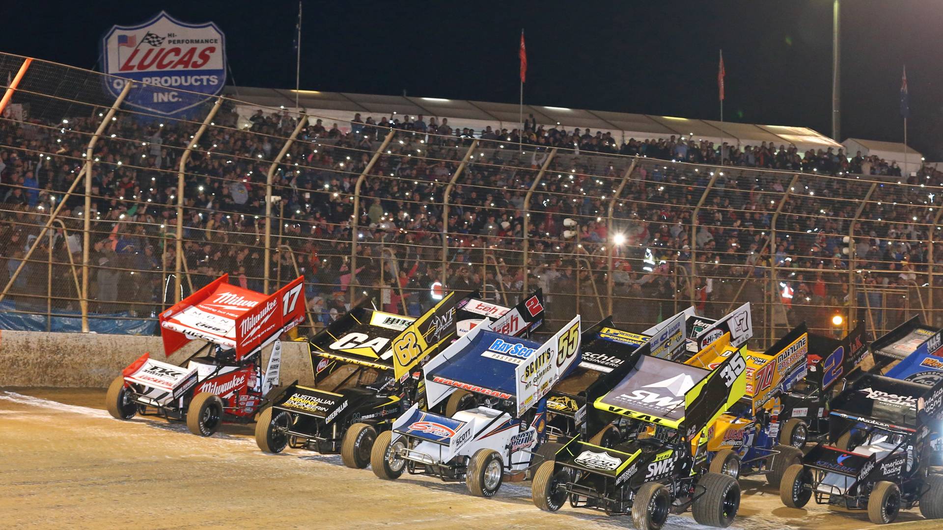 Speedway cars ready to race.