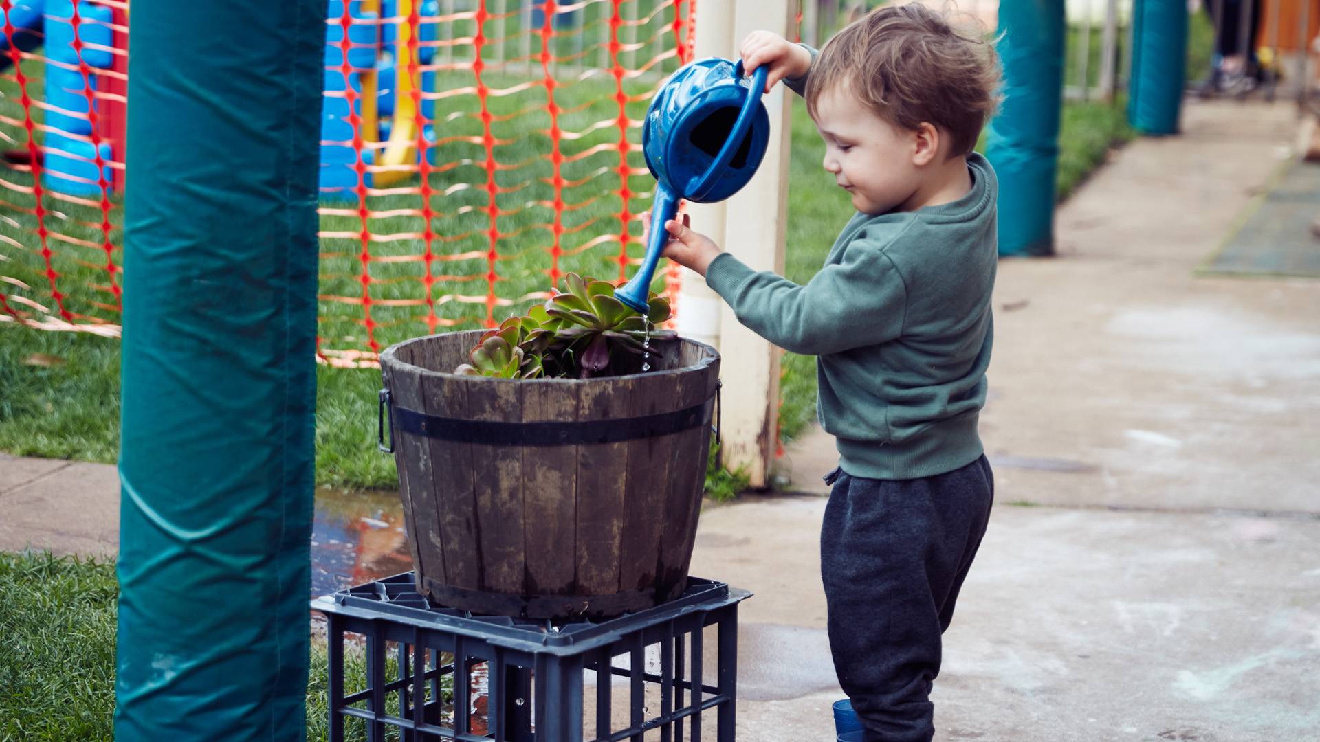 Child with Watering can