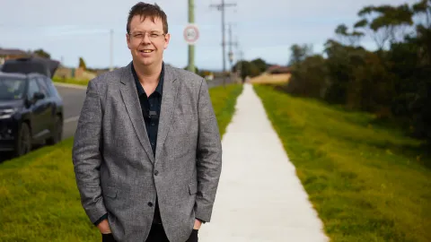 Warrnambool Mayor Cr Ben Blain on the new footpath