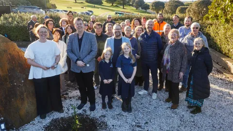 Attendees at the tree planting ceremony