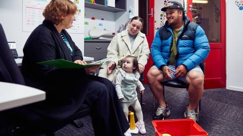 Maternal and Child Health Nurse Sarah Benfell with Gianna and her parents Tahnee and Tahi