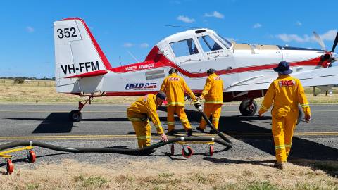 CFA volunteers loading firefighting aircraft