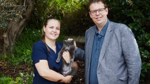 Warrnambool Animal Shelter Attendant Lillian Teal and Mayor Ben Blain with Gulliver the cat.