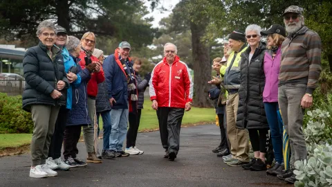 Trevor Hearfield with Deputy Mayor Vicki Jellie (left) and Heart Foundation Walking Group members