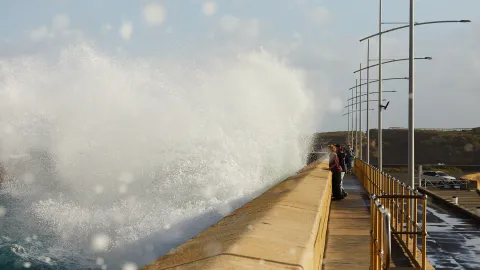 Huge wave hitting the breakwater at Warrnambool.