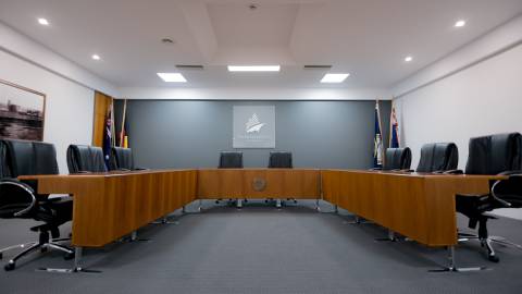 Seats and desks in the Council chambers.