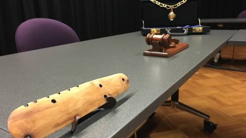 Mayoral chains, gavel and Gunditjmara ceremonial shield representation. 