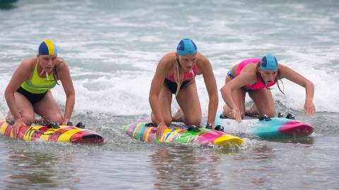 Girls on Surf life saving boards